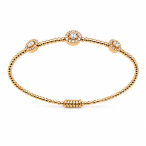 Pulsera en oro rosa rígida con diamantes.