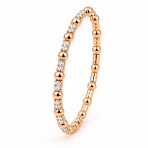 Pulsera rigida con bolas oro y diamantes.